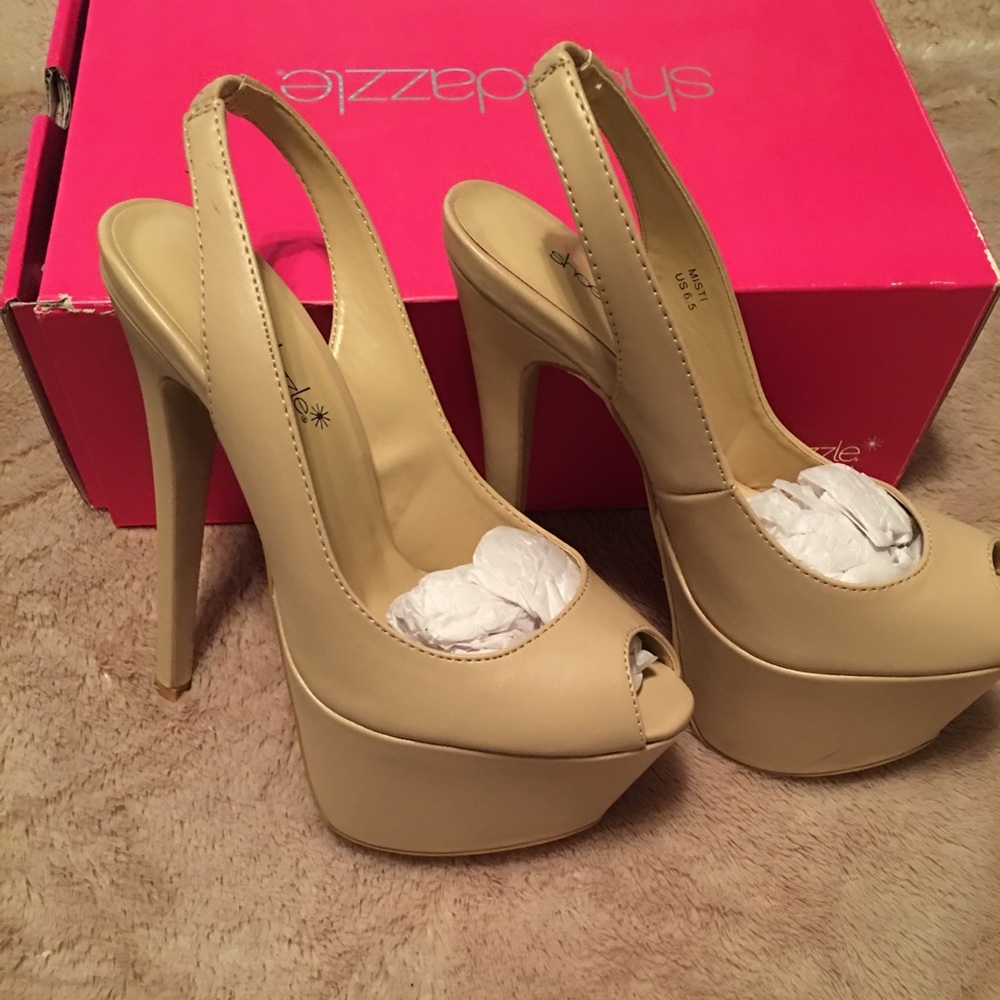 Nude high heel shoes.